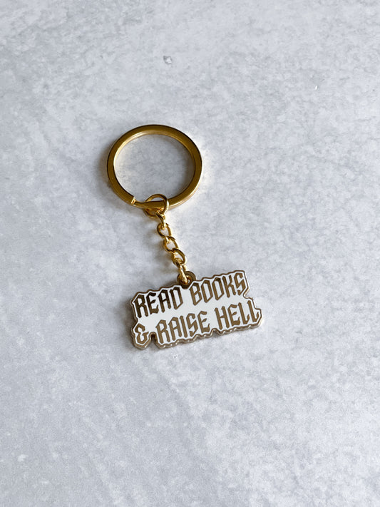 Read Books & Raise Hell Hard Enamel Keychain